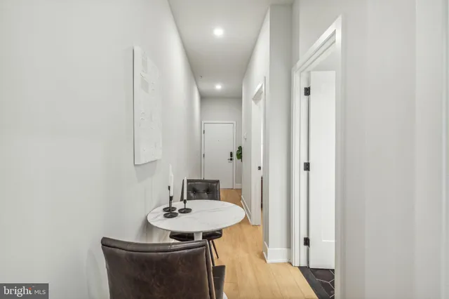 a view of a bathroom with sink and mirror