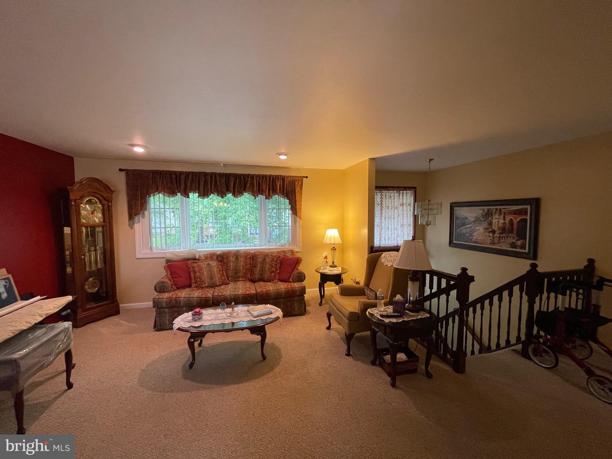 4010 Winlee Road Randallstown, MD 21133 - Photo 13 of 41 a living room with furniture and a window