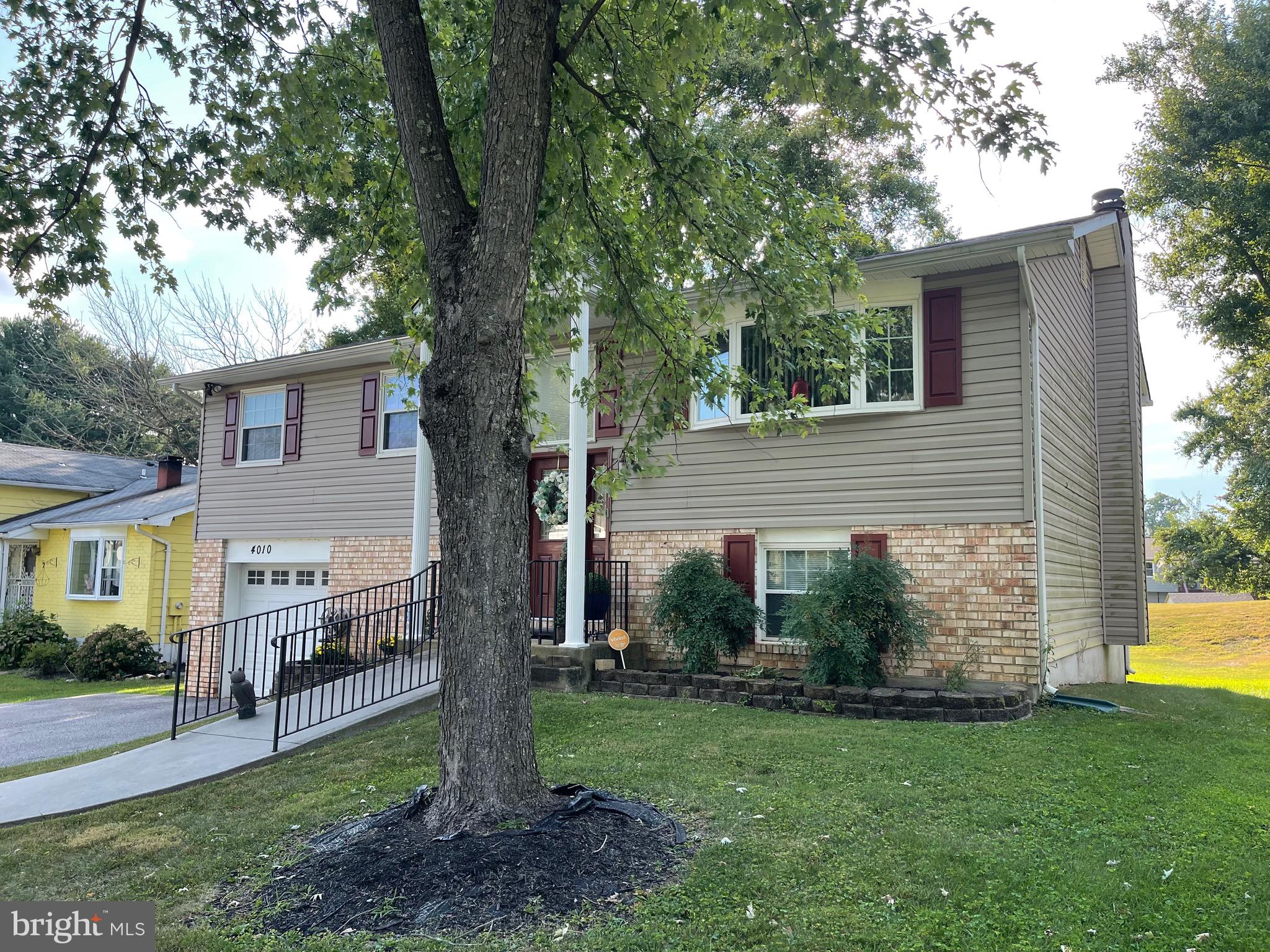 4010 Winlee Road Randallstown, MD 21133 - Photo 2 of 41 a view of a house with a backyard