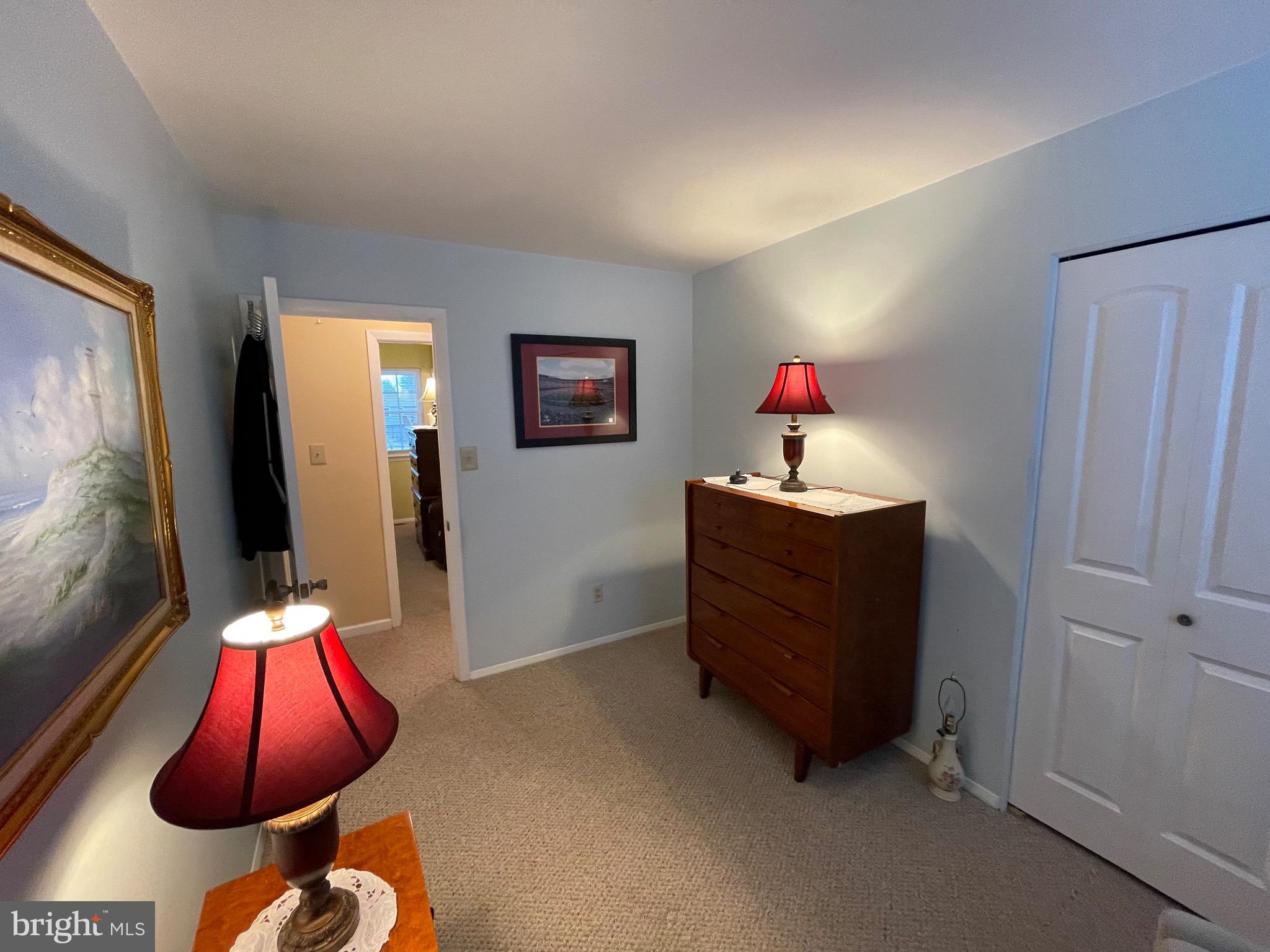4010 Winlee Road Randallstown, MD 21133 - Photo 26 of 41 a room with furniture and a lamp on table