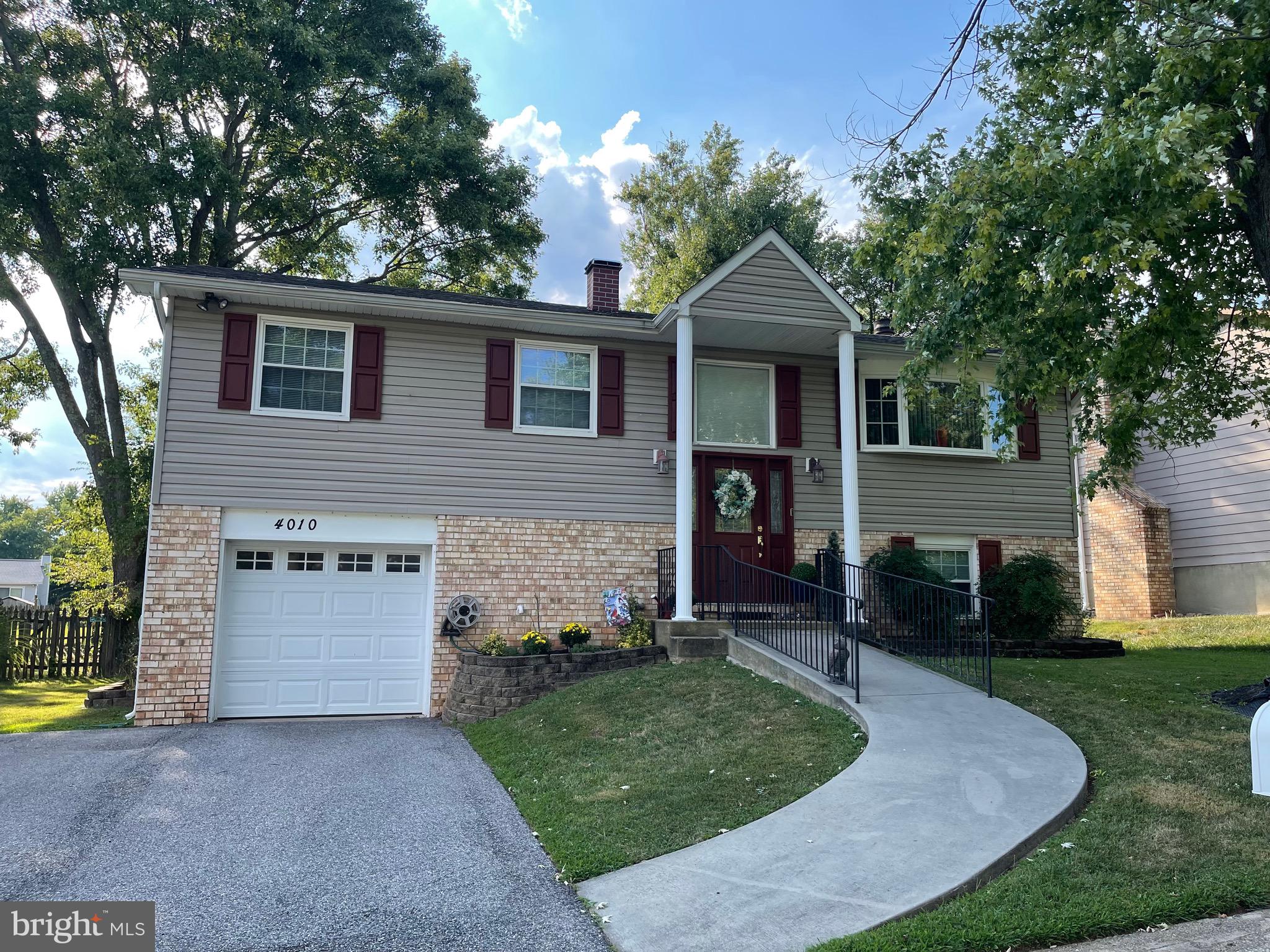 4010 Winlee Road Randallstown, MD 21133 - Photo 3 of 41 front view of a house with a yard