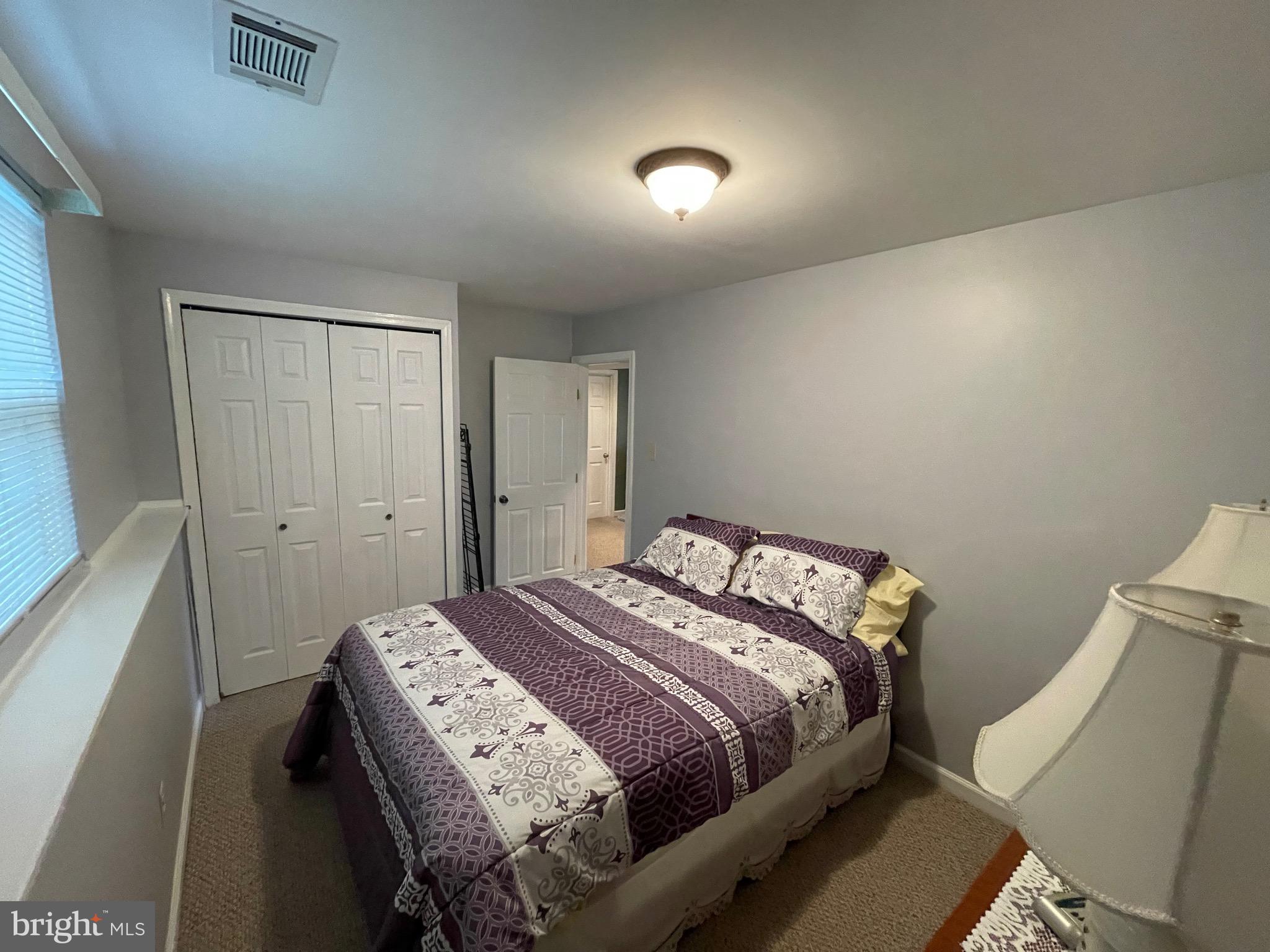4010 Winlee Road Randallstown, MD 21133 - Photo 36 of 41 a bedroom with a bed and a window