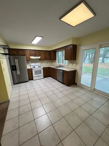 a large white room with a large window