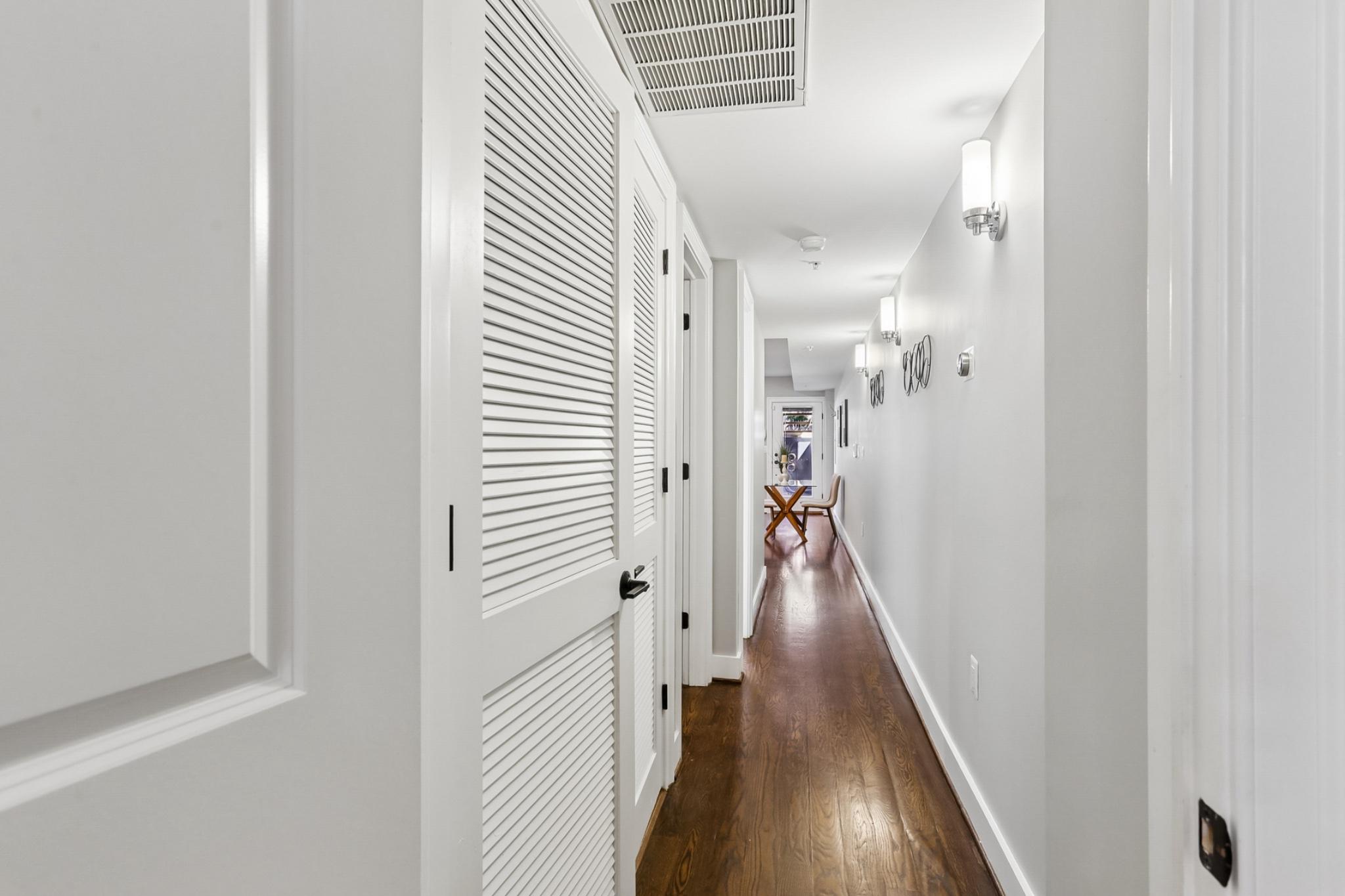 1311 K Street Southeast, Unit 1 Washington, DC 20003 - Photo 23 of 33 Hallway with second full bath.