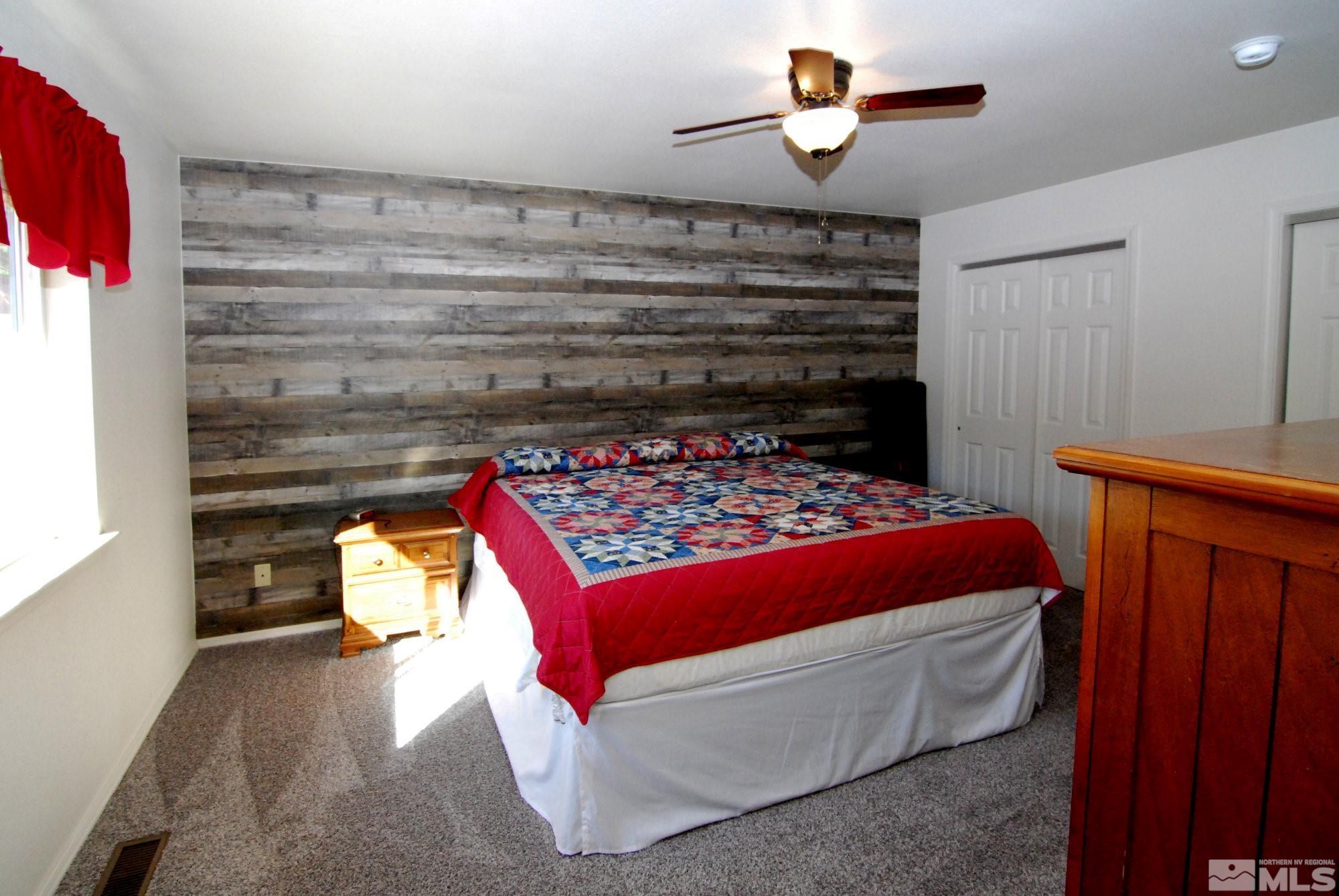 230 Whitaker Lane Fallon, NV 89406 - Photo 16 of 23 a room with a bed and cabinets