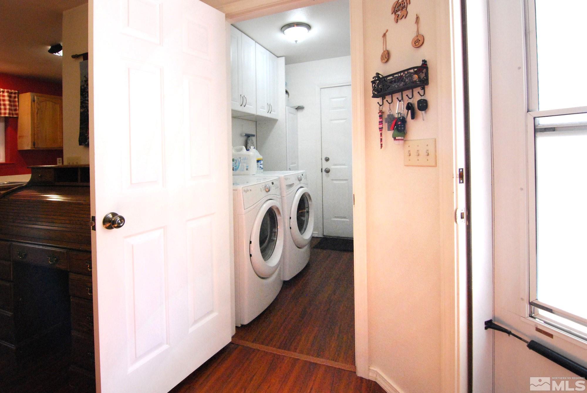 230 Whitaker Lane Fallon, NV 89406 - Photo 18 of 23 a view of a hallway with washer and dryer