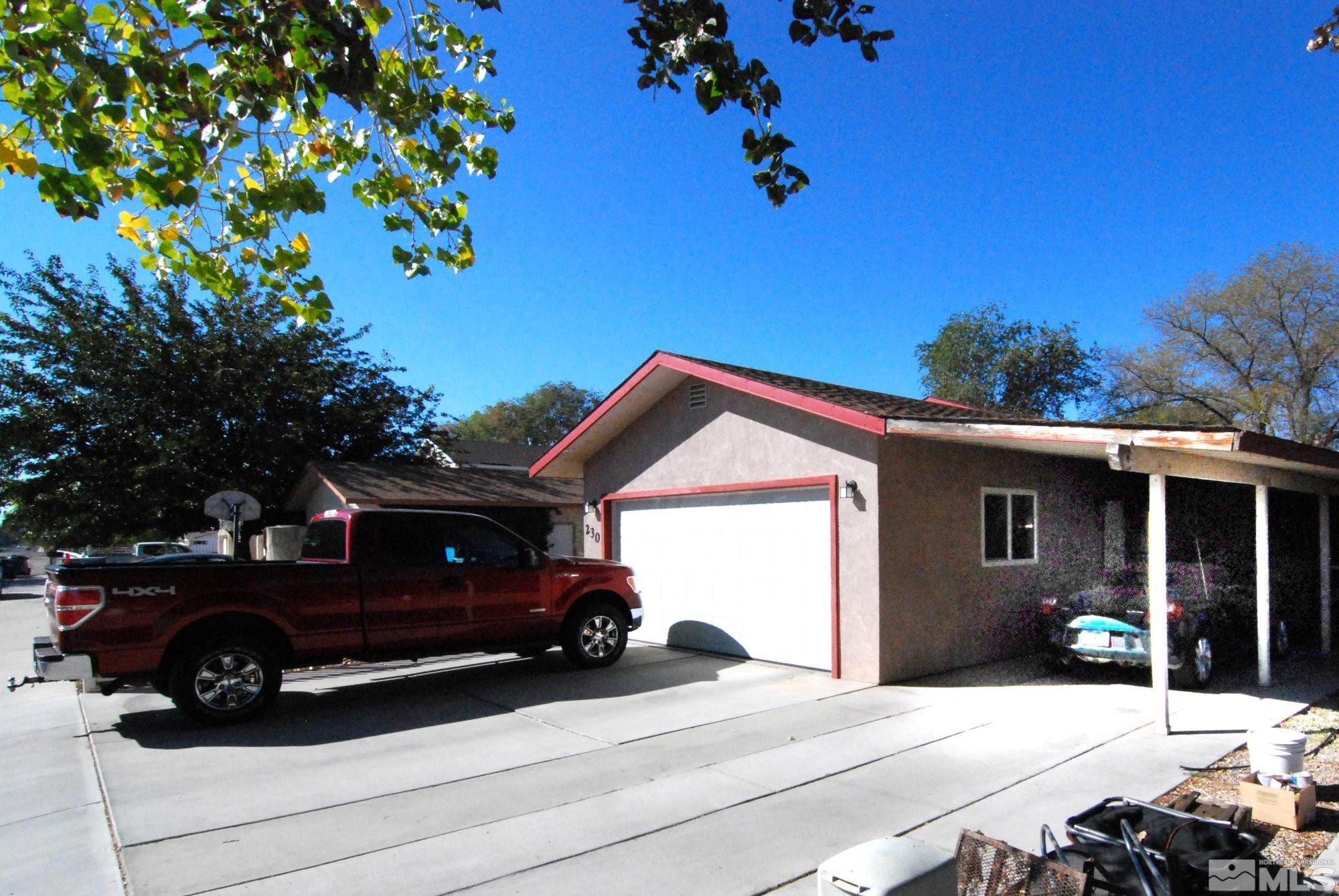 230 Whitaker Lane Fallon, NV 89406 - Photo 3 of 23 a view of a car parked in front of a house