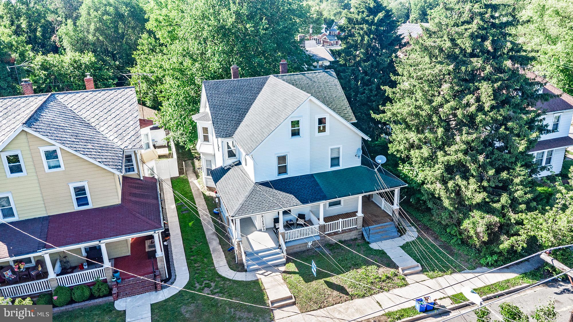 223 Johnson Street Salem, NJ 08079 - Photo 3 of 5 an aerial view of residential house with outdoor space and trees around