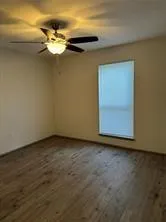 a view of a room with a fan