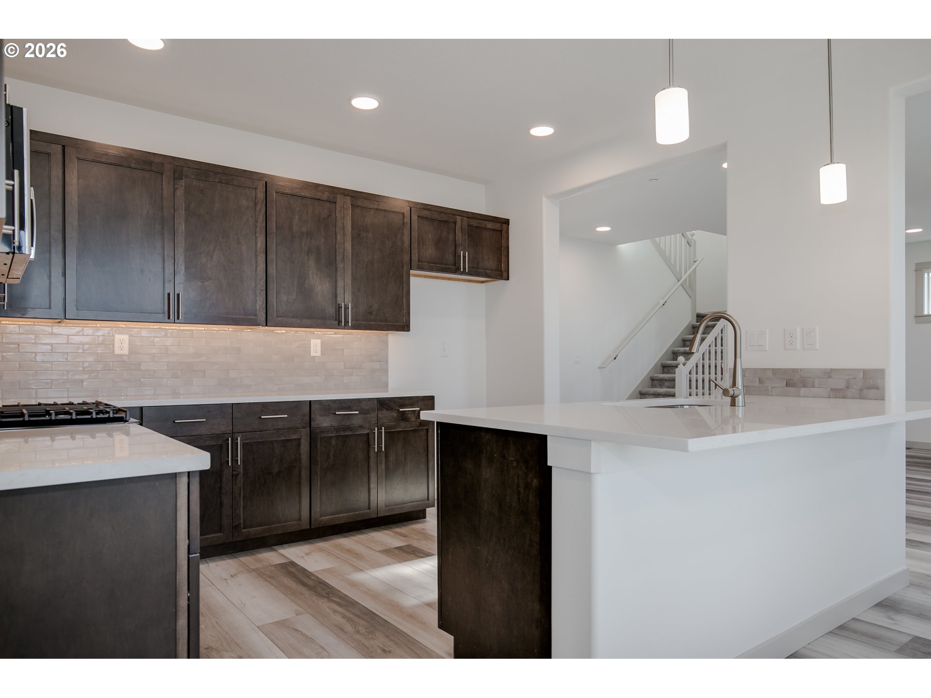 3714 Weldon Lane Eugene, OR 97403 - Photo 11 of 36 a kitchen with a sink and cabinets