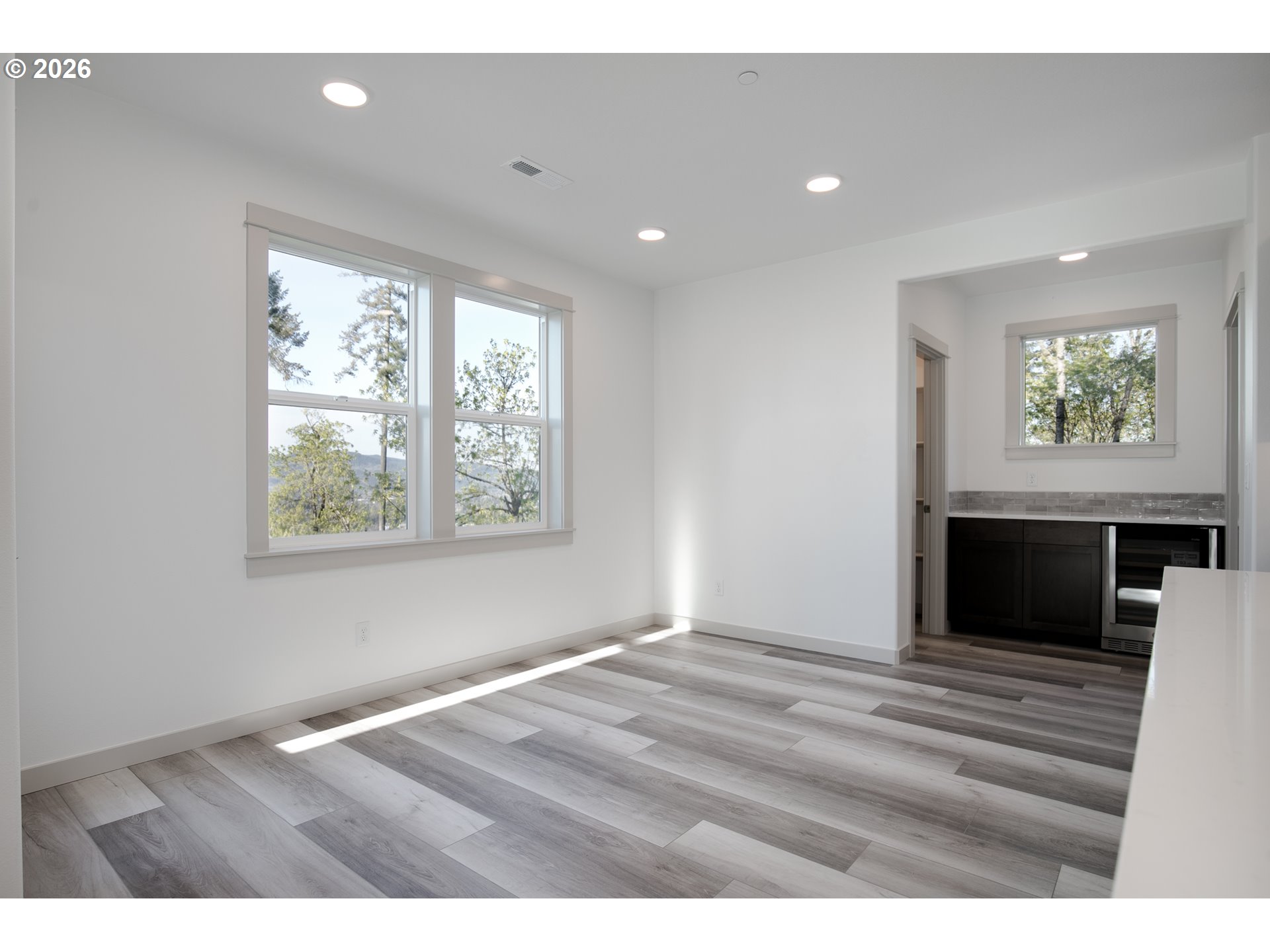 3714 Weldon Lane Eugene, OR 97403 - Photo 13 of 36 a view of empty room with window and fireplace