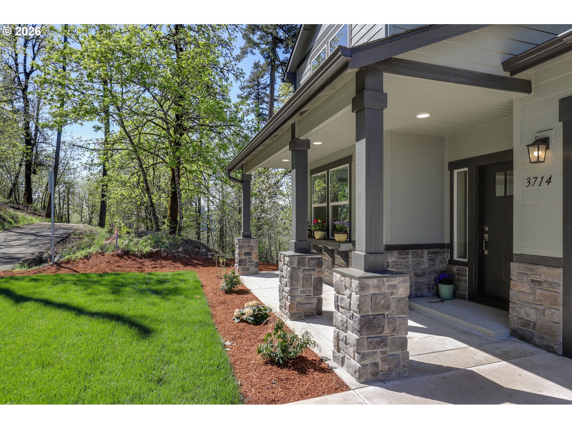 3714 Weldon Lane Eugene, OR 97403 - Photo 2 of 36 a view of a patio with table and chairs and potted plants