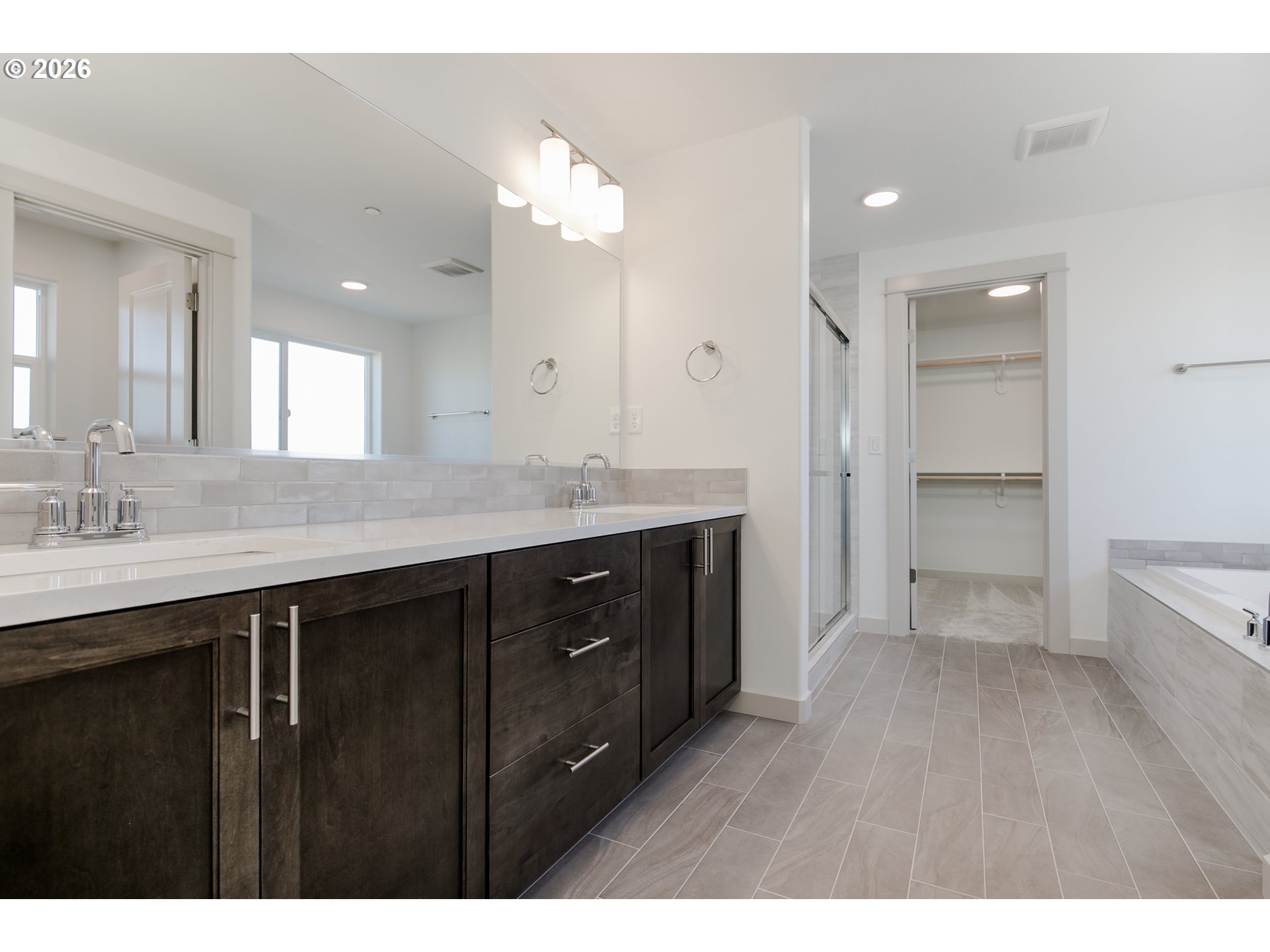 3714 Weldon Lane Eugene, OR 97403 - Photo 23 of 36 a bathroom with a sink vanity granite tub and a mirror