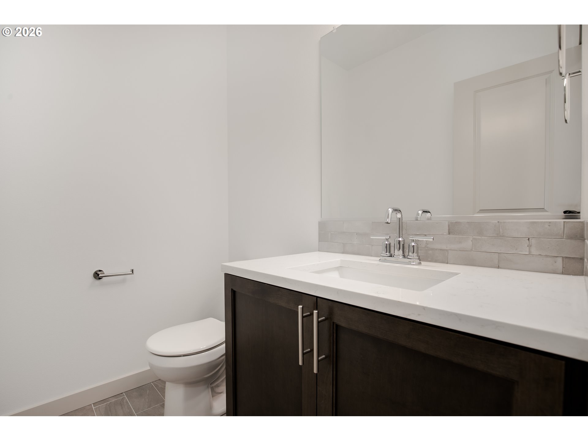 3714 Weldon Lane Eugene, OR 97403 - Photo 7 of 36 a bathroom with a sink a toilet and mirror