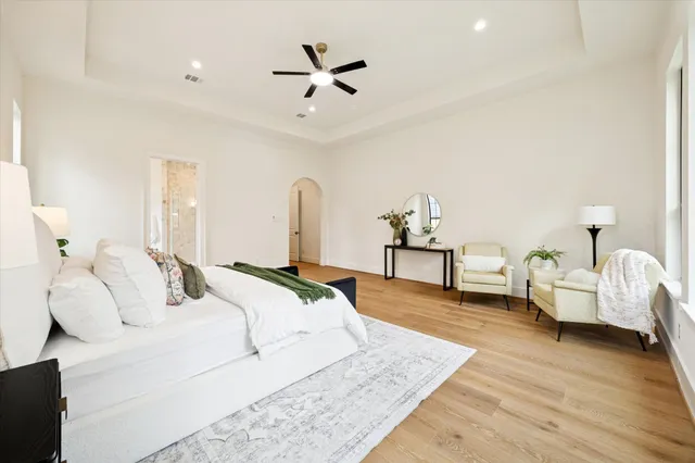 an empty room with wooden floor