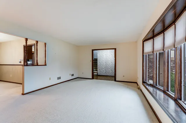 an empty room with windows