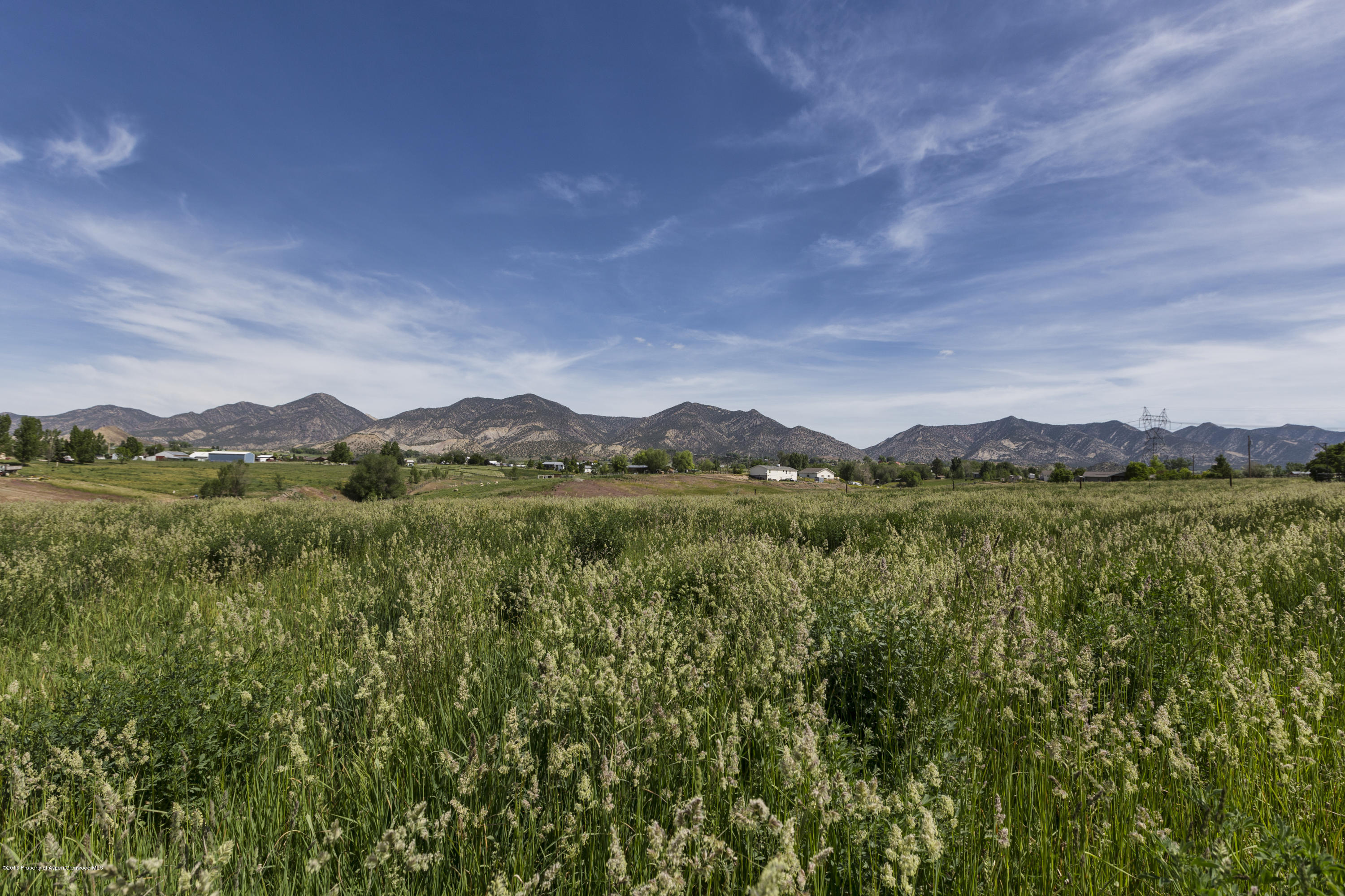 630 Lariat Road Silt, CO 81652 - Photo 6 of 21 a view of lake with mountain in the back