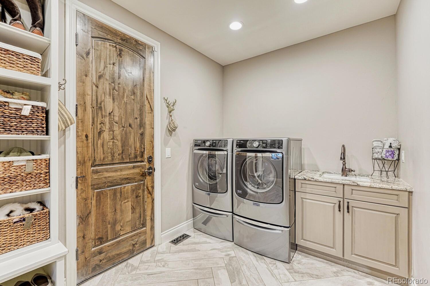 2236 Beechnut Place Castle Rock, CO 80108 - Photo 17 of 40 a utility room with dryer and washer