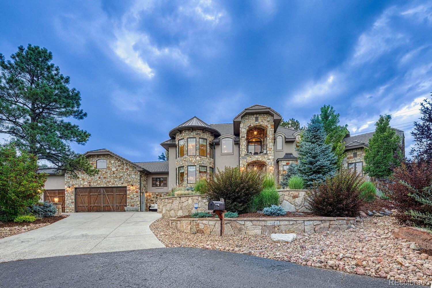 2236 Beechnut Place Castle Rock, CO 80108 - Photo 2 of 40 a front view of a house with garden