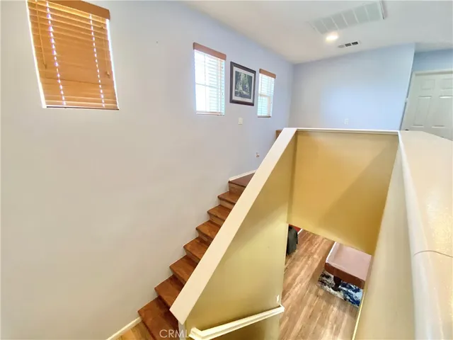 a view of a room with windows