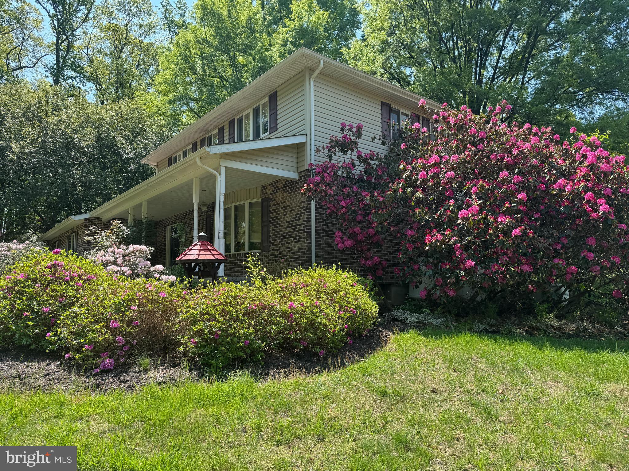 6008 Fork Woods Road Baldwin, MD 21013 - Photo 3 of 12 a front view of a house with a yard