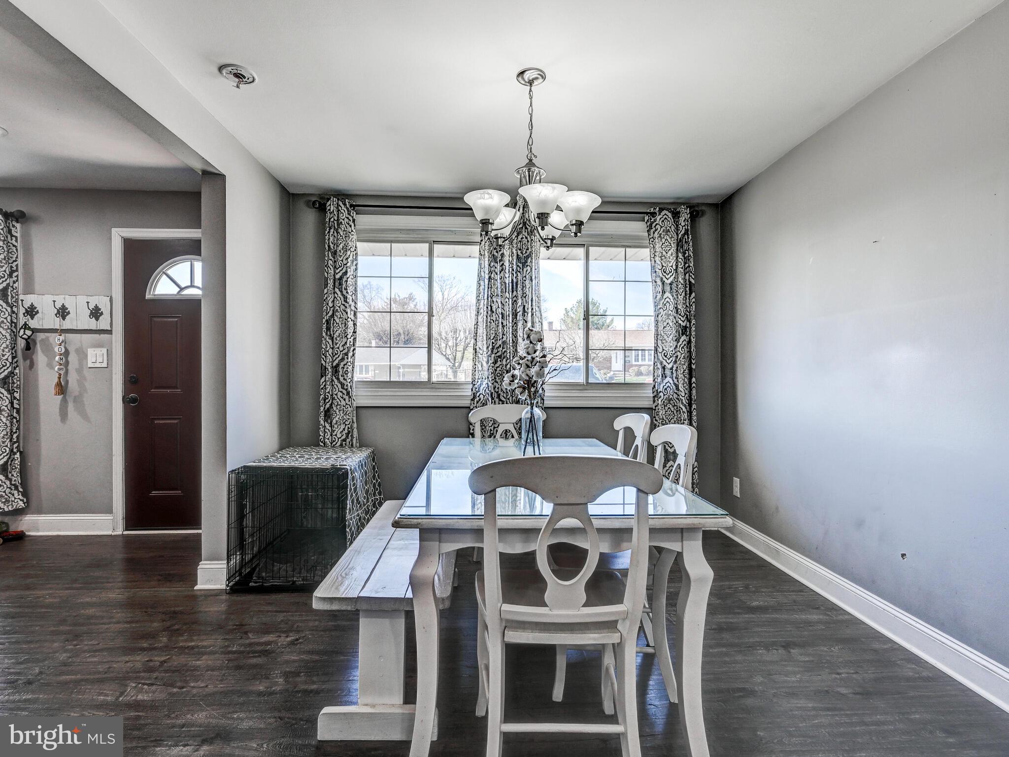 2712 Burridge Road Baltimore, MD 21234 - Photo 13 of 32 a view of a dining room with furniture window and wooden floor