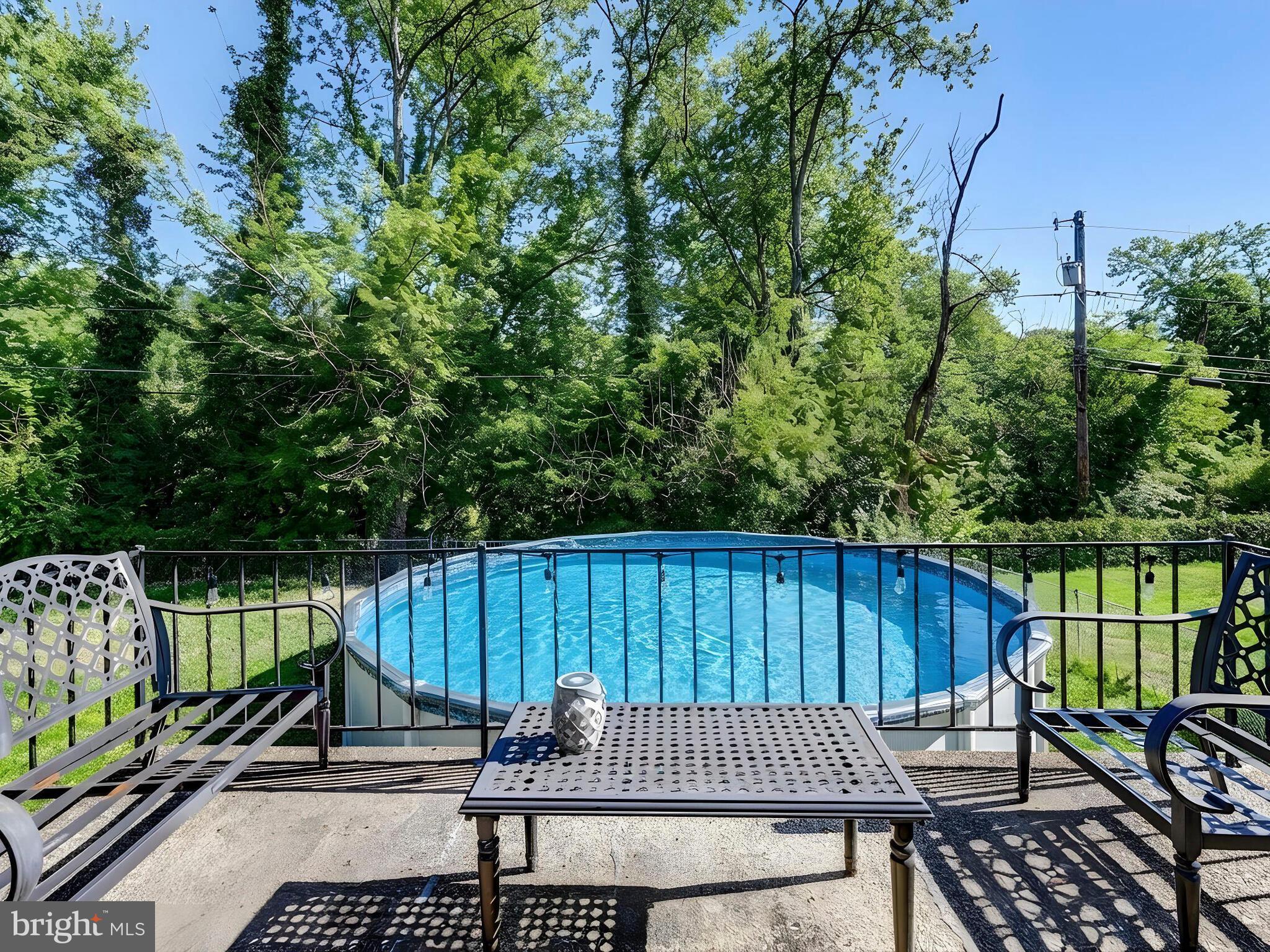2712 Burridge Road Baltimore, MD 21234 - Photo 29 of 32 a view of a wooden deck with furniture