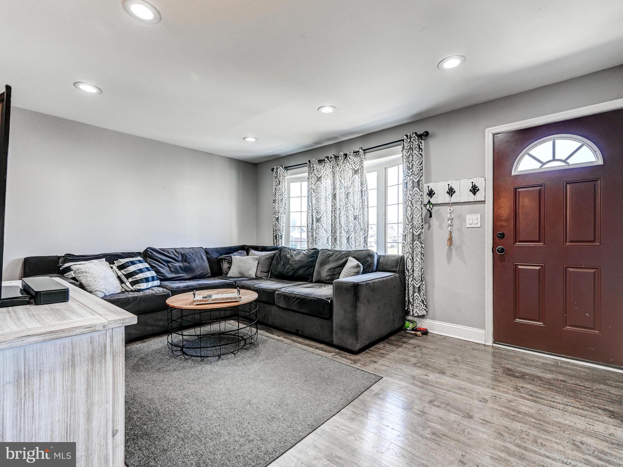 2712 Burridge Road Baltimore, MD 21234 - Photo 9 of 32 a living room with furniture and a window