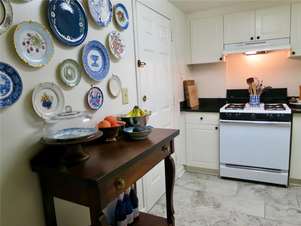 1501 Clairmont Road, Unit 713 Decatur, GA 30033 - Photo 18 of 29 a kitchen with kitchen island and appliances