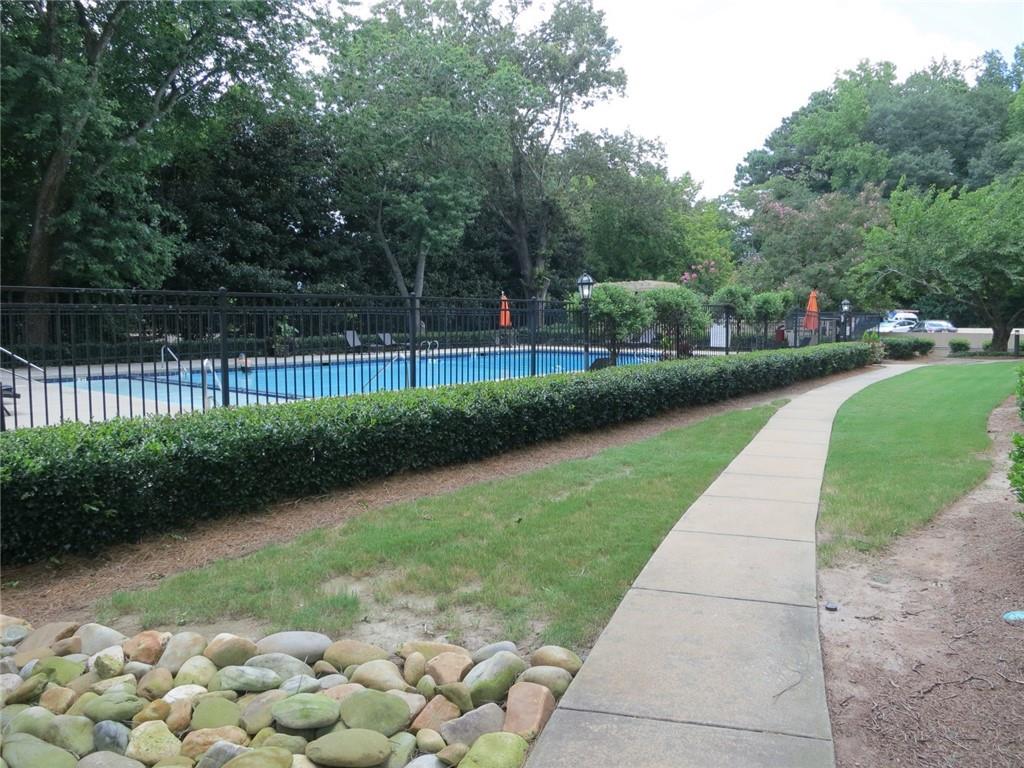 1501 Clairmont Road, Unit 713 Decatur, GA 30033 - Photo 27 of 29 a view of a garden with a pathway
