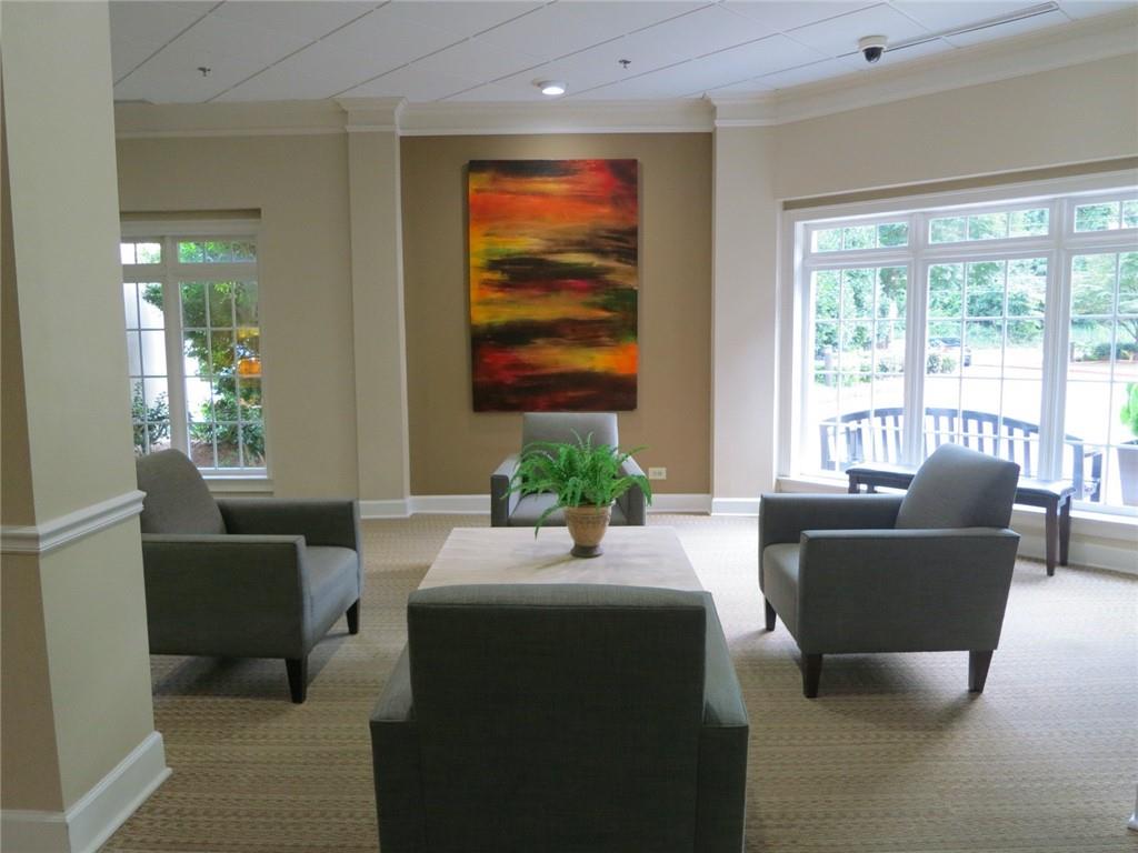 1501 Clairmont Road, Unit 713 Decatur, GA 30033 - Photo 4 of 29 a living room with furniture and windows