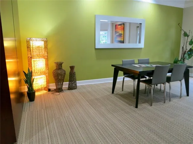 a view of a livingroom with furniture and wooden floor