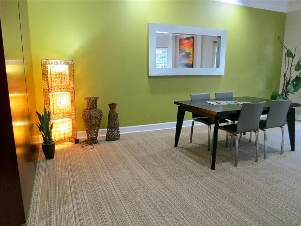 1501 Clairmont Road, Unit 713 Decatur, GA 30033 - Photo 5 of 29 a view of a livingroom with furniture and wooden floor