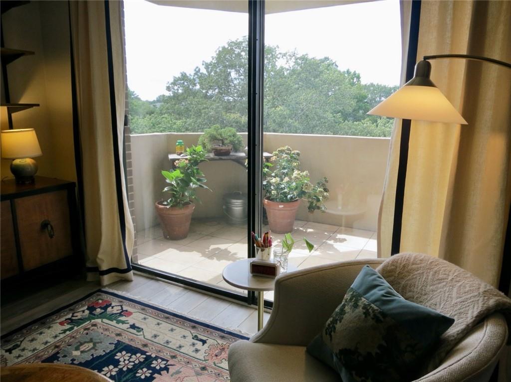 1501 Clairmont Road, Unit 713 Decatur, GA 30033 - Photo 10 of 29 a bed sitting in a bedroom next to a window