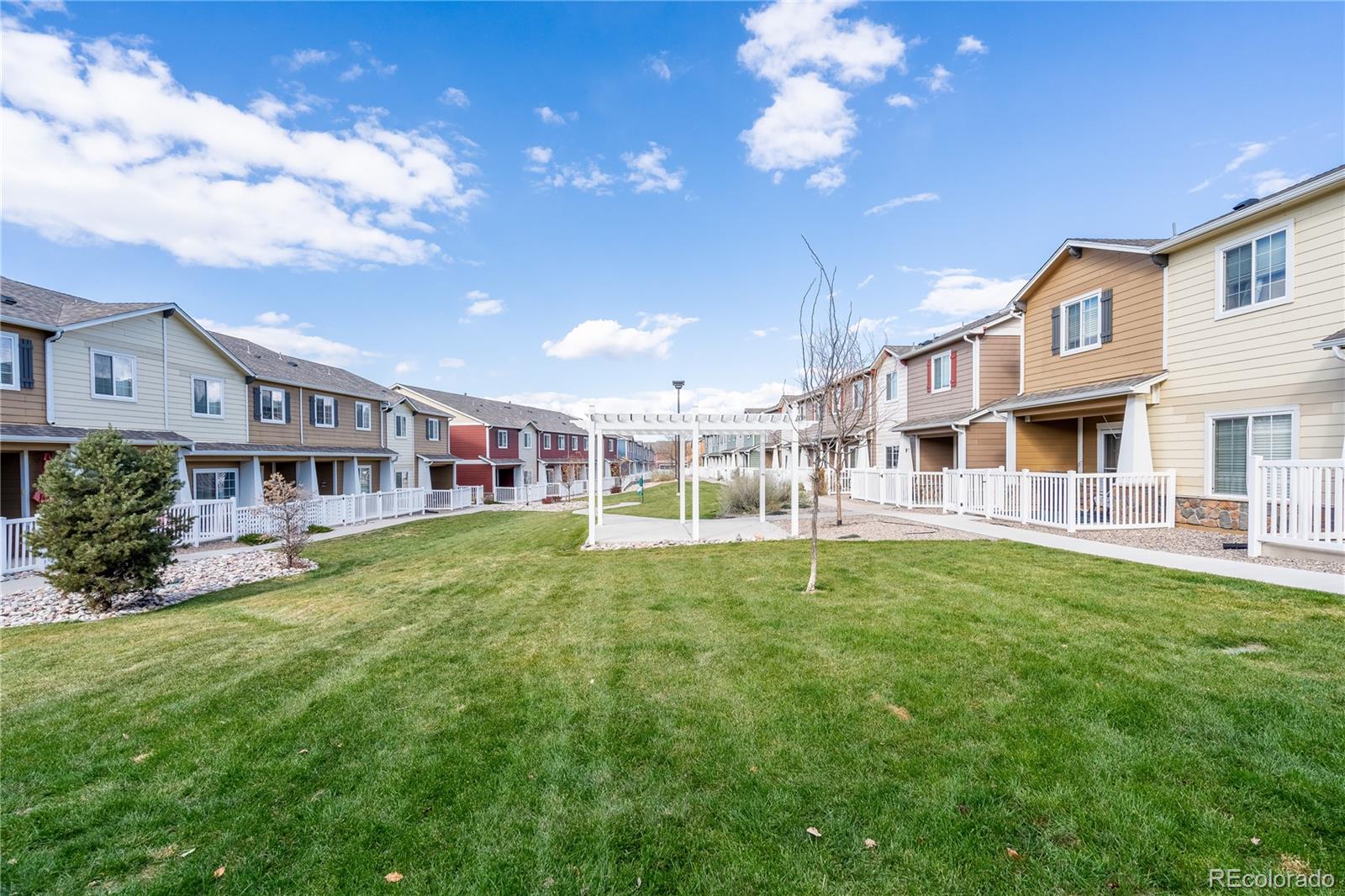 4910 Pearl Kite View Colorado Springs, CO 80916 - Photo 2 of 16 a view of an apartment with a garden
