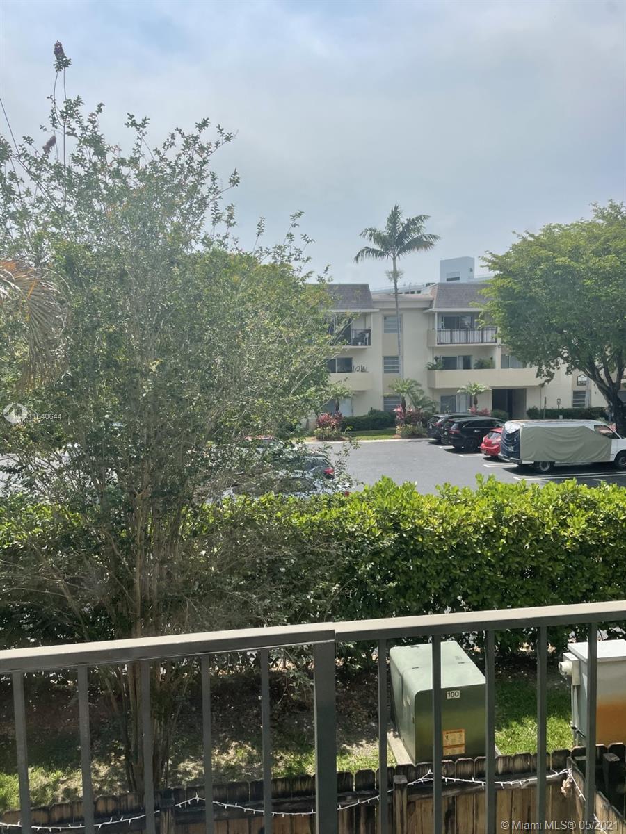 6709 North Kendall Drive, Unit 222 Pinecrest, FL 33156 - Photo 12 of 23 a view of a city from a balcony