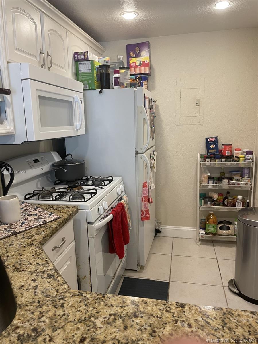 6709 North Kendall Drive, Unit 222 Pinecrest, FL 33156 - Photo 6 of 23 a view of a storage & utility room