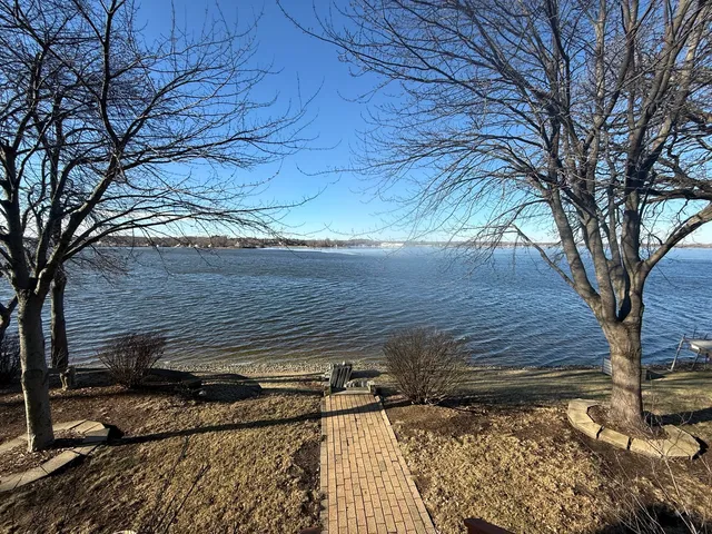 a bathroom with a sink a vanity and a mirror