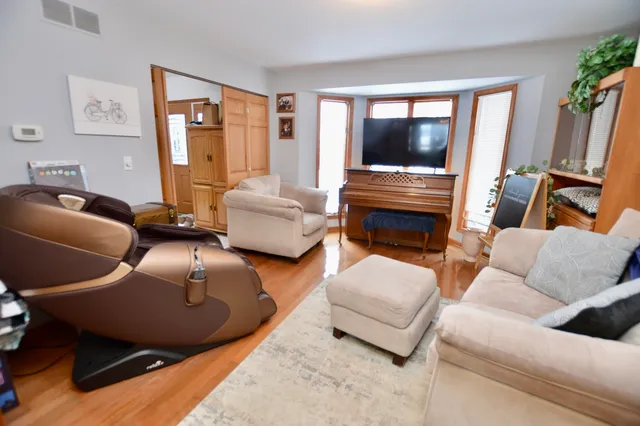a room with furniture and air hockey table