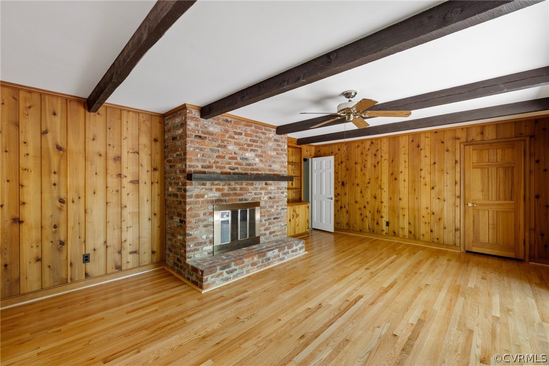 4534 Forrestal Road Chester, VA 23831 - Photo 12 of 39 a view of a livingroom with wooden floor fireplace and a window