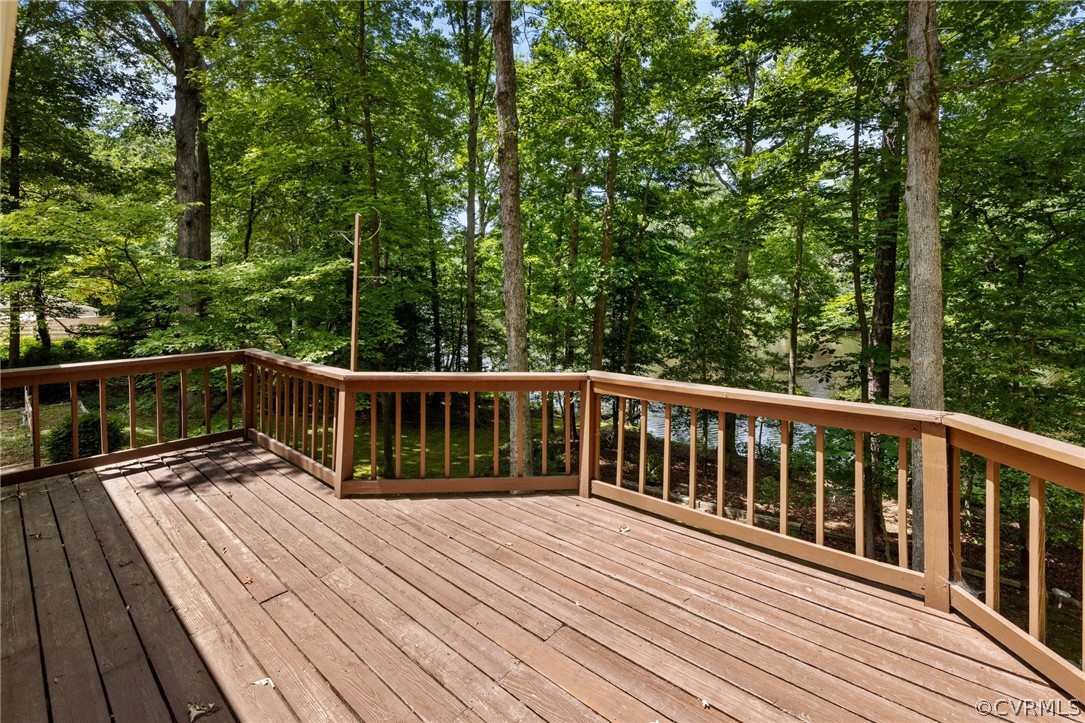 4534 Forrestal Road Chester, VA 23831 - Photo 13 of 39 a view of balcony with wooden floor and fence