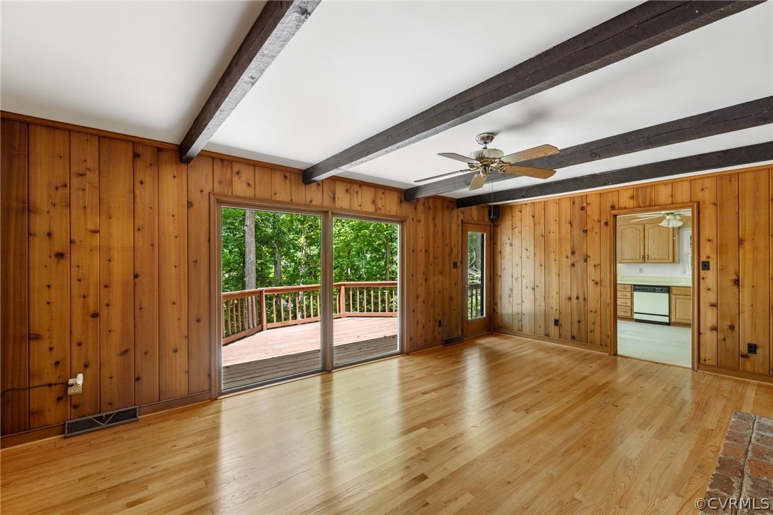 4534 Forrestal Road Chester, VA 23831 - Photo 17 of 39 an empty room with wooden floor and windows