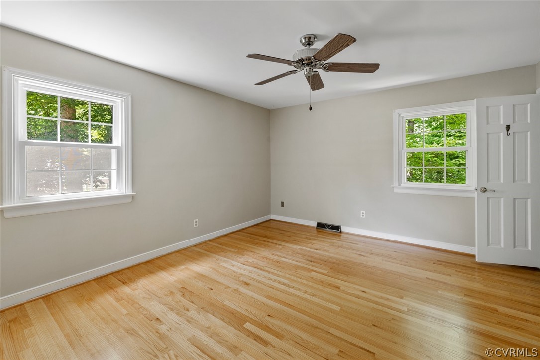 4534 Forrestal Road Chester, VA 23831 - Photo 20 of 39 a view of empty room with wooden floor and fan