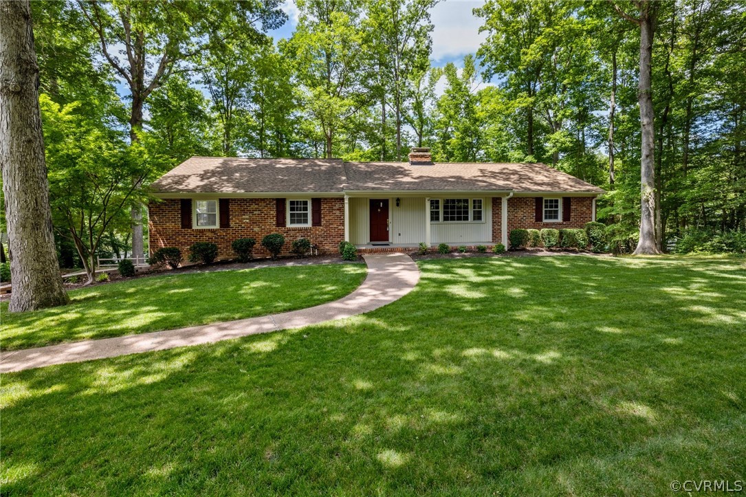 4534 Forrestal Road Chester, VA 23831 - Photo 2 of 39 a front view of house with yard and green space