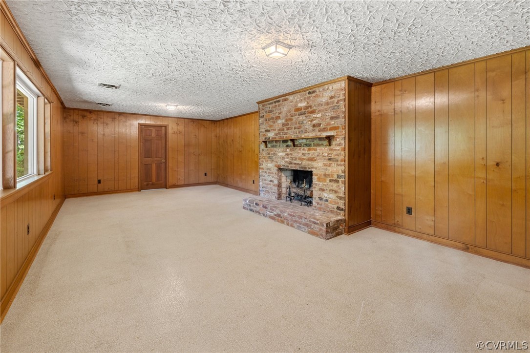 4534 Forrestal Road Chester, VA 23831 - Photo 22 of 39 an empty room with windows & fireplace