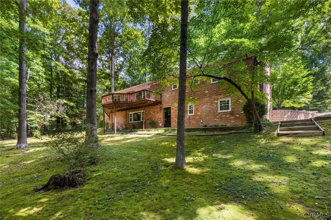 4534 Forrestal Road Chester, VA 23831 - Photo 34 of 39 a backyard of a house with lots of green space