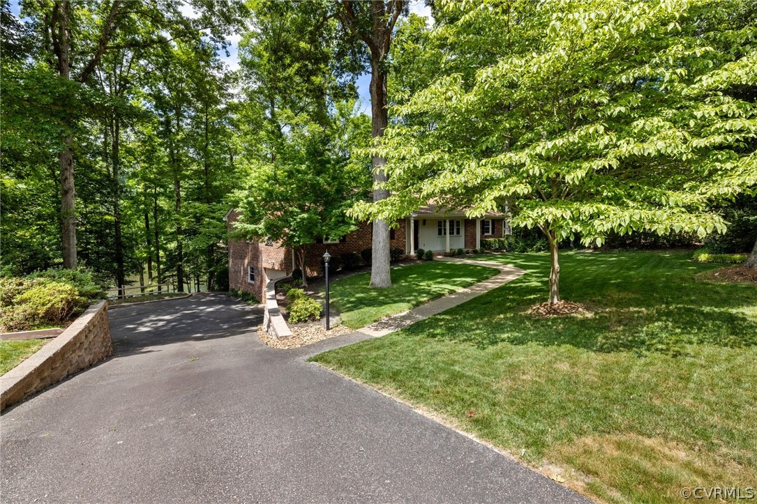 4534 Forrestal Road Chester, VA 23831 - Photo 39 of 39 a garden view with a seating space