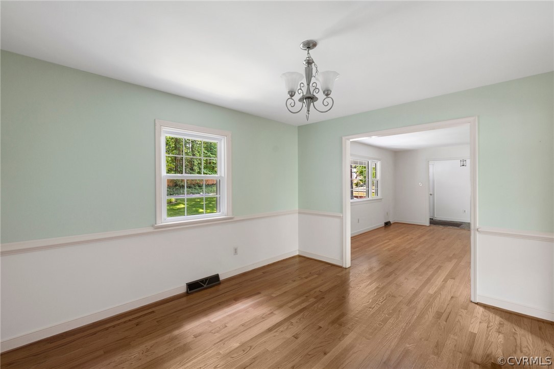 4534 Forrestal Road Chester, VA 23831 - Photo 7 of 39 a view of empty room with wooden floor and fan