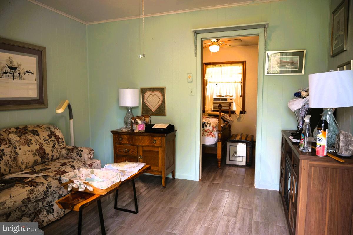 31858 River Park Road Millington, MD 21651 - Photo 14 of 15 a living room with furniture and a wooden floor
