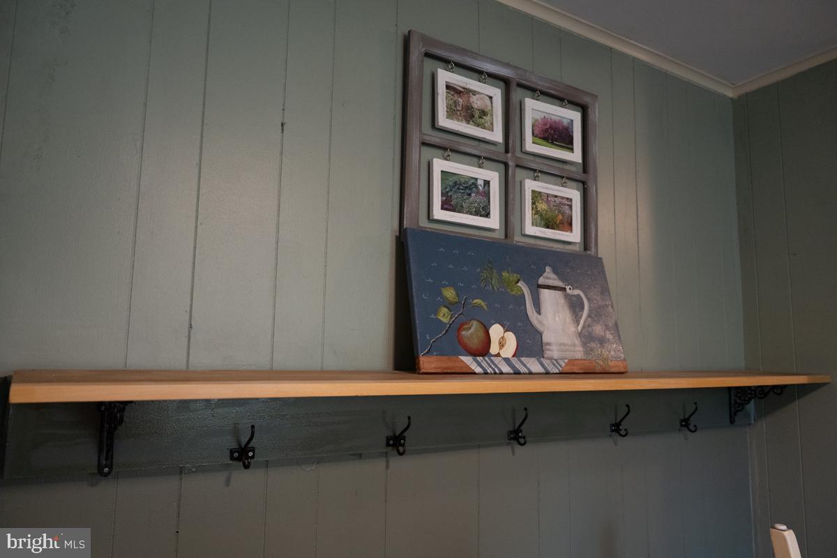 31858 River Park Road Millington, MD 21651 - Photo 15 of 15 a bathroom with a sink and cabinets